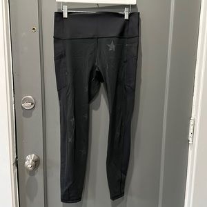 Black Gap Fit leggings with stars